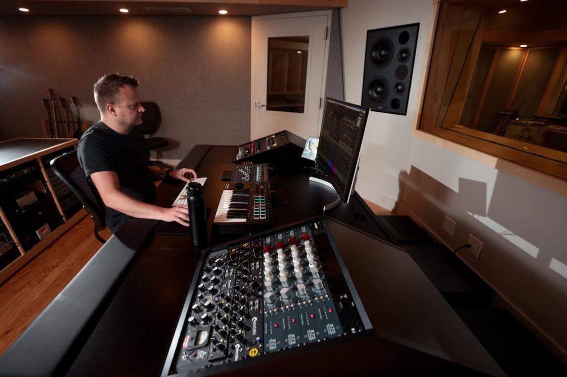 Kenny McWilliams works in Archer Avenue Studio at River Drive Creative in Columbia on Wednesday, June 18, 2025. The building houses the recording studio and Caroline Guitar Company.