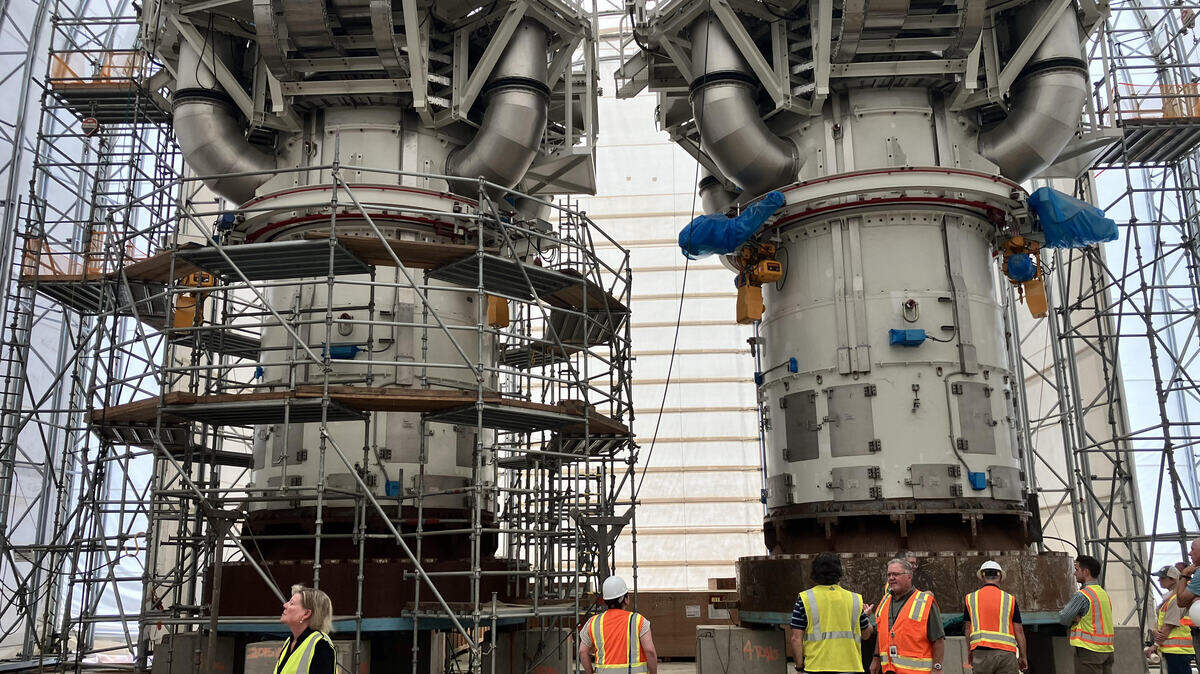 Massive equipment for a failed nuclear construction project northwest of Columbia is scattered across the V.C. Summer atomic power site. In this picture, an advisory board tours a temporary storage building with two 39-foot high reactor vessel heads.