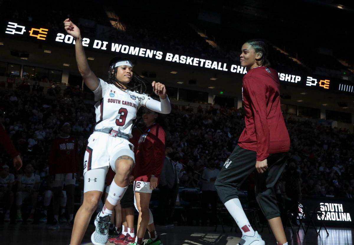 South Carolina’s Destanni Henderson (3)  and South Carolina’s LeLe Grissett (24) dance during team introductions during the first round of the NCAA Regional tournament on Friday, March 18, 2022 at the Colonial Life Arena. The Gamecocks hosted Howard.