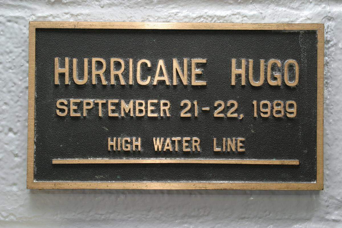 A plaque, which hangs nearly six-feet high on the wall of Lincoln High School in McClellanville, S.C., shows how high water rose in the school during Hurricane Hugo in 1989.