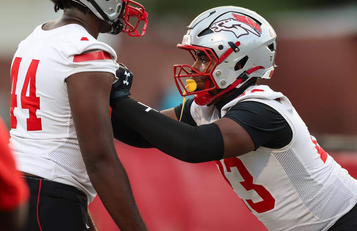 Seth Tillman (23) of South Pointe warms up before AC Flora’s game against South Pointe at Memorial Stadium on Sept. 19.
