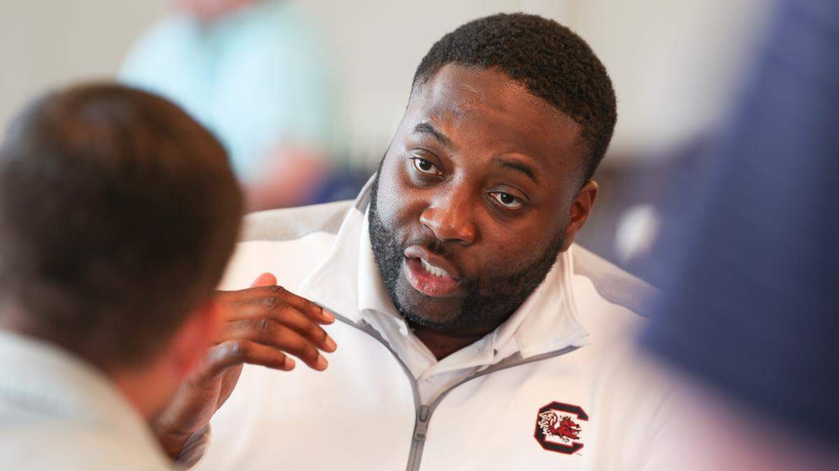 South Carolina defensive ends/outside linebacker coach Sterling Lucas speaks to the media during the Birdies with Beamer event at Cobblestone Club on Monday, July 28, 2025.