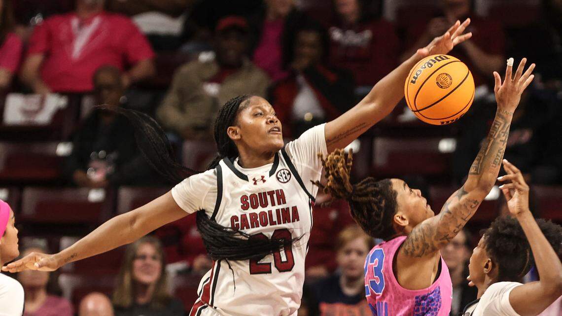 University of South Carolina’s Sania Feagin (20) blocks a shot by Florida’s Liv McGill (23) during the first half of action in the Colonial Life Arena on Thursday, Feb. 13, 2025.