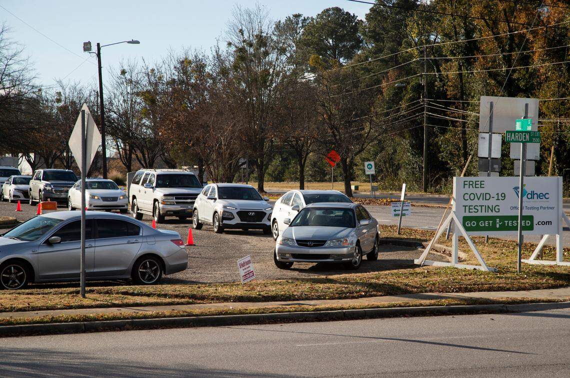 A long line of cars waits for coronavirus tests at the South Carolina Department of Health and Environmental Control in Columbia, South Carolina on Wednesday, December 23, 2020.