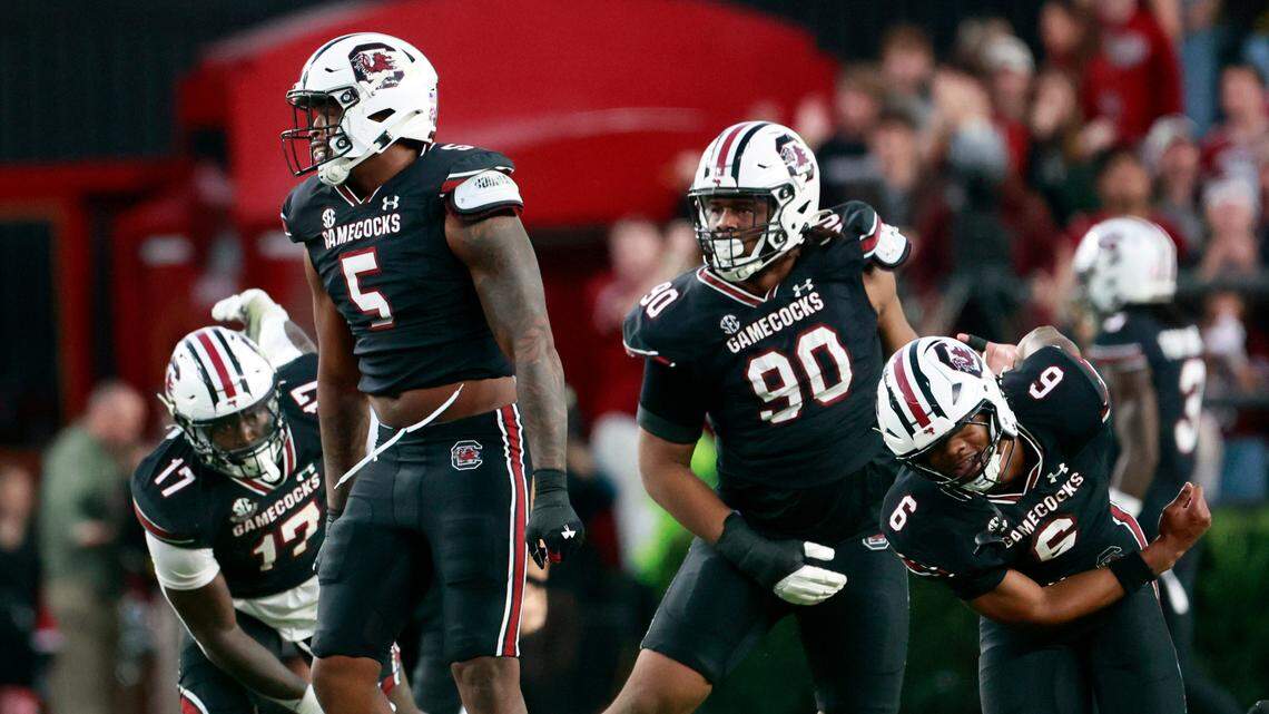 South Carolina defenders celebrate sacking a Missouri quarterback on Saturday, November 16, 2024.