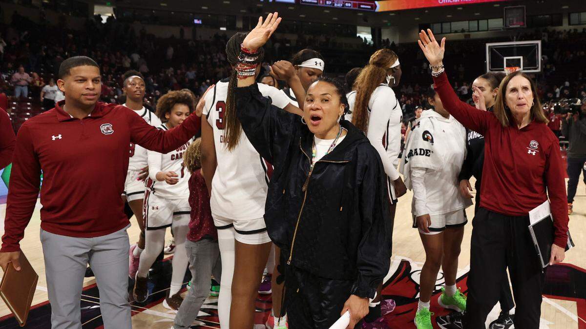 University of South Carolina Head Coach Dawn Staley waves to the crowd after the Gamecocks played East Carolina in the Colonial Life Arena on Sunday, Nov. 17, 2024