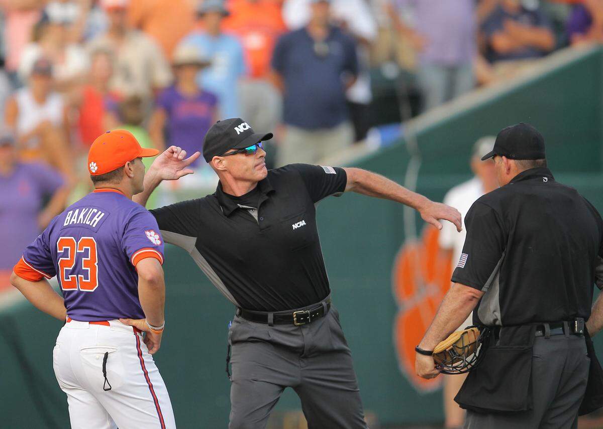 Clemson head coach Erik Bakich is thrown out of the game by Billy Van Raaphorst during NCAA Super Regionals action on Sunday, June 9, 2024 in Clemson, S.C.