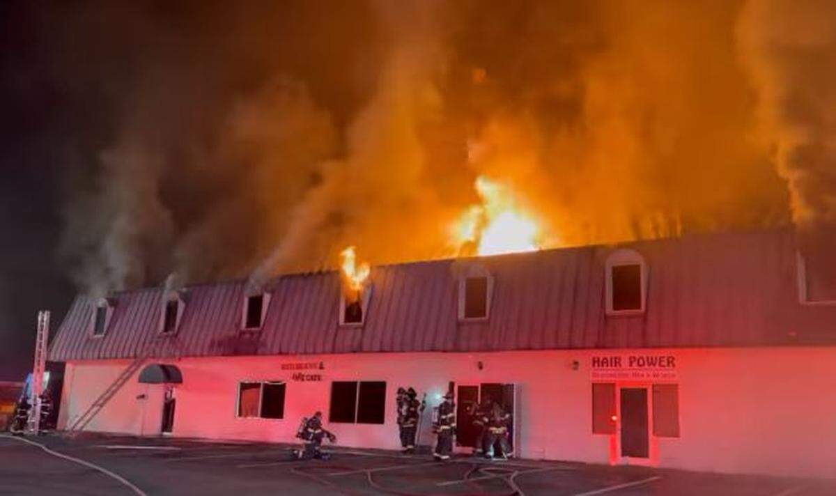 The Irmo Fire District battles a blaze at a strip mall in Columbia.