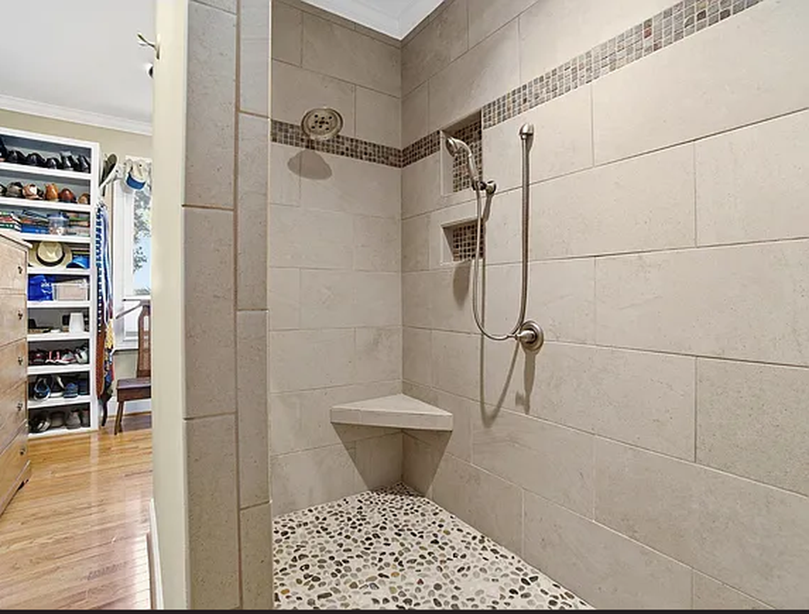 A shower in one of the 13 bathrooms inside the $7 million house on Lake Murray now listed for sale on Zillow.