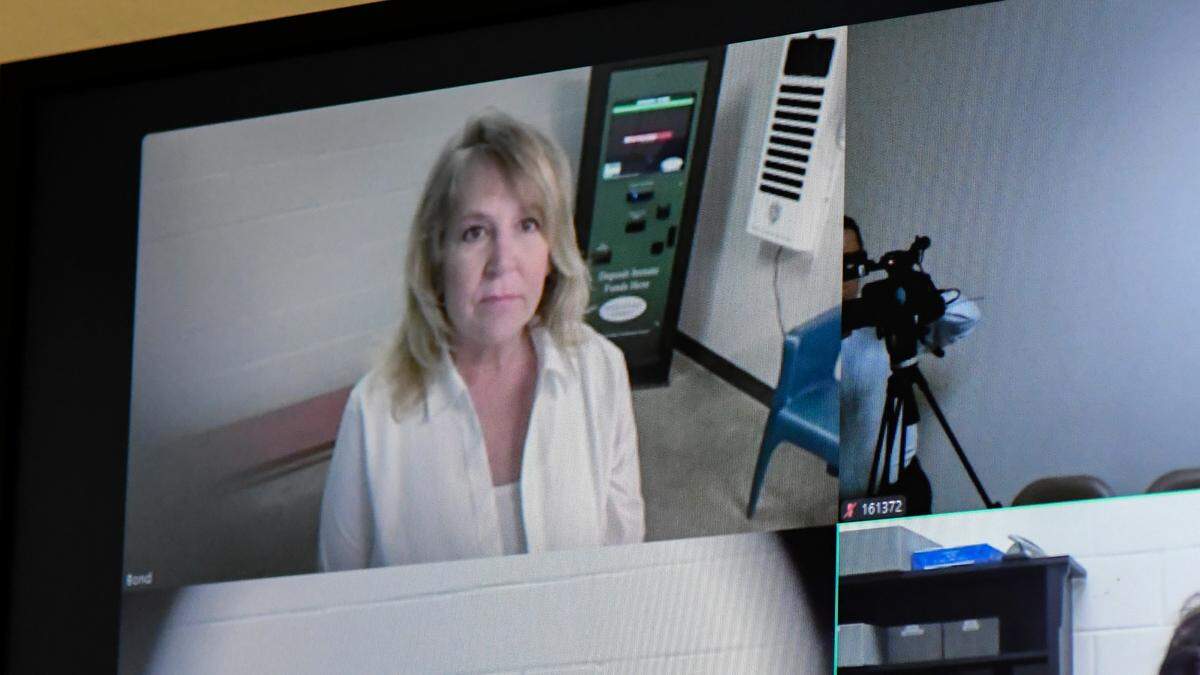 Former Colleton County clerk of court Becky Hill appears before the Honorable Magistrate Court Judge Jennifer Fishburne for her arraignment hearing on May 14, 2025, at the Colleton County Detention Center in Walterboro, S.C. Hill, released on her own recognizance, has been charged with two counts of misconduct in office and one count of obstructing justice.