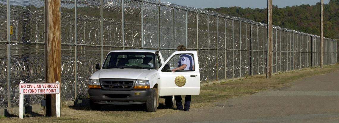 An officer at the Broad River Correctional Institution in Columbia patrols the perimeter of the prison, which houses South Carolina’s death row.