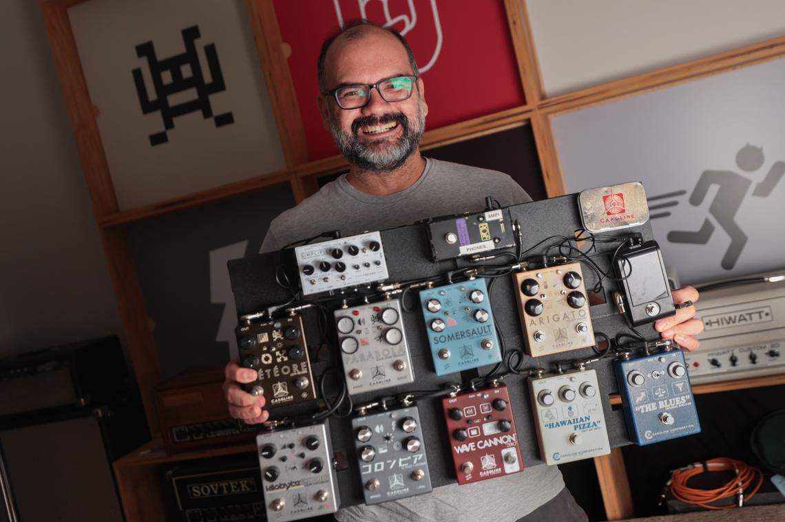 Philippe Herndon shows a display of guitar effects pedals produced by his company, Caroline Guitar Company on Wednesday, June 18, 2025. Herndon partnered with Kenny McWilliams to renovate a building on River Drive to house their music businesses.