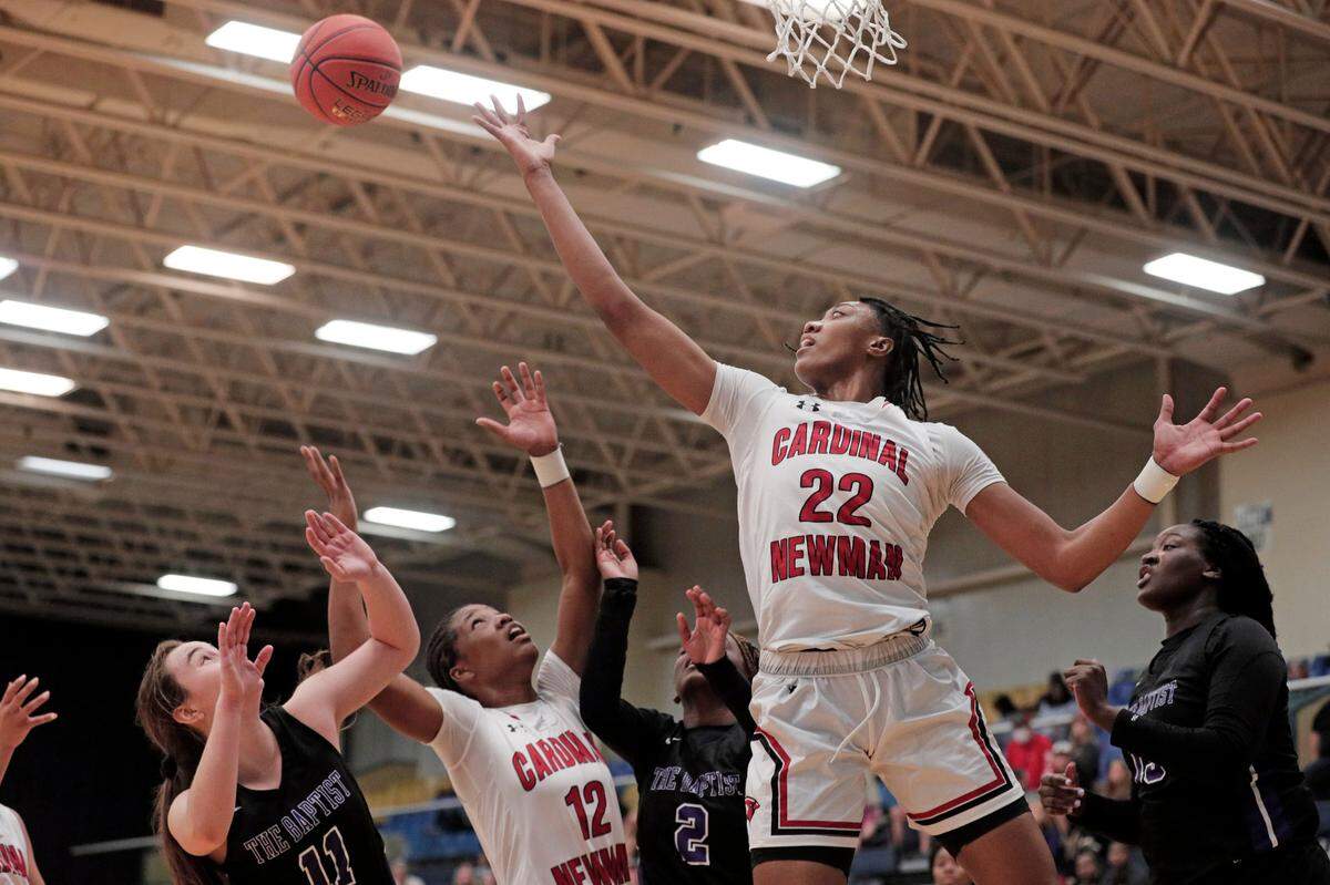 Cardinal Newman’s Ashlyn Watkins 22 plays First Baptist in the SCISA tournament at the Sumter Civic Center on Saturday, February 26, 2022.