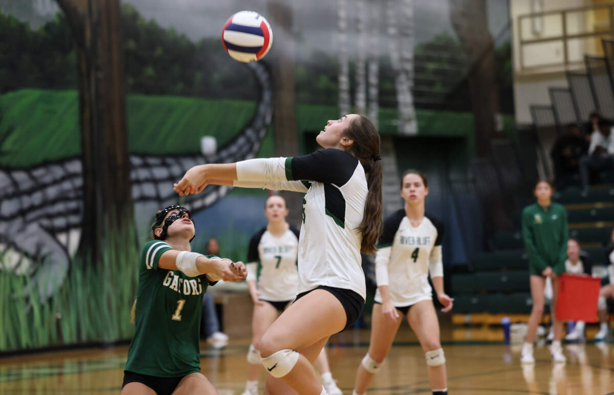 Alexis Jodie (16) and Masyn McClanahan (1) of River Bluff chase down a ball during Lexington’s game against River Bluff at River Bluff in Columbia on Thursday, October 17, 2024.