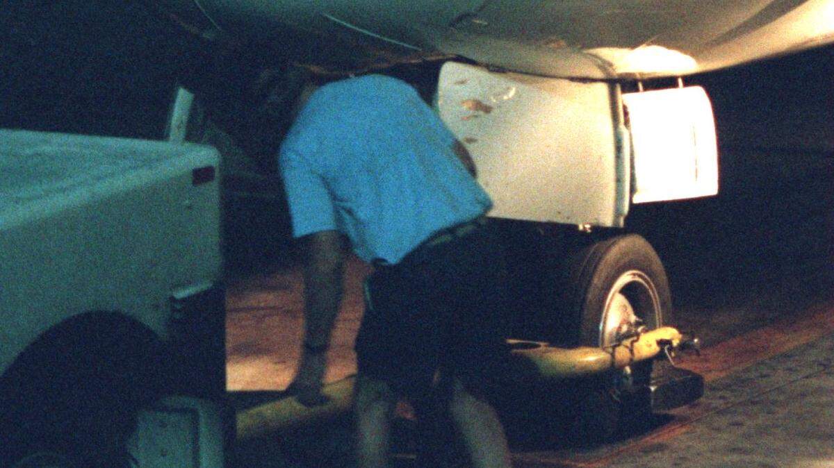 An airplane goes through an inspection in this unrelated file photo.