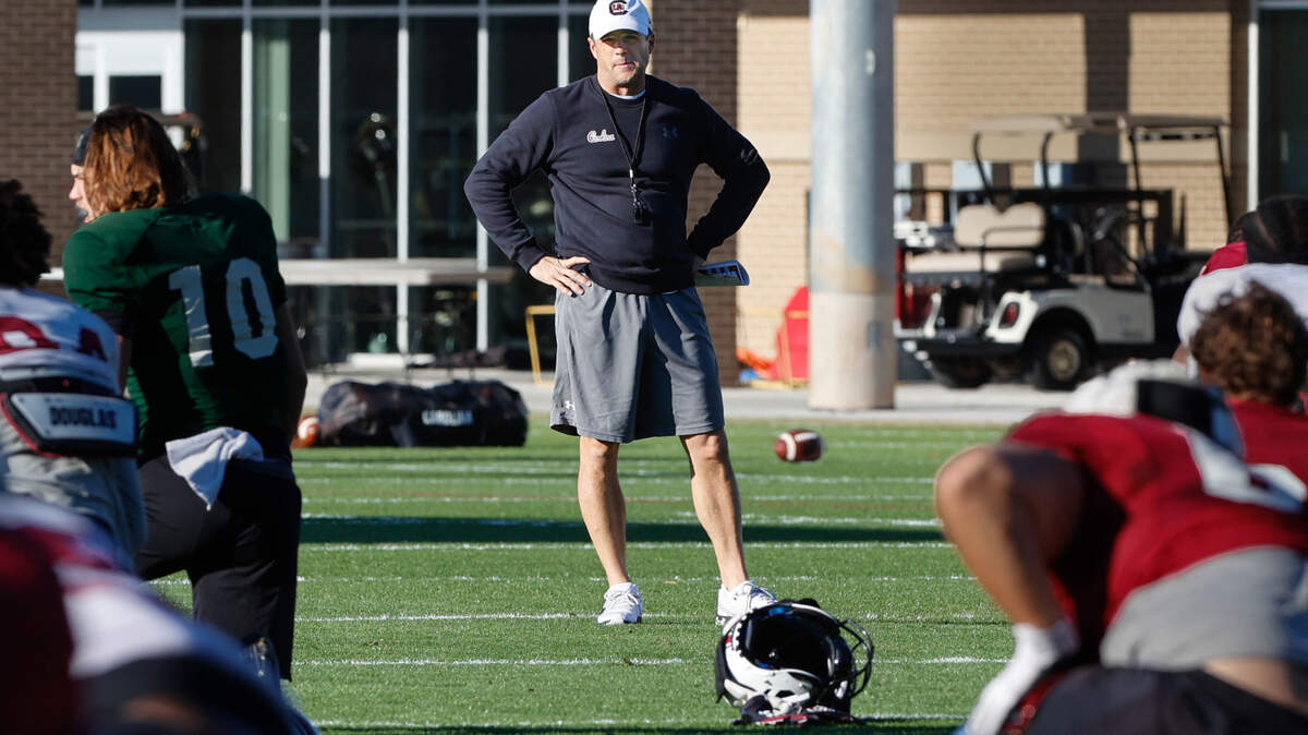 South Carolina’s head coach Shane Beamer watches the team stretch during practice on Monday, Dec. 13, 2021. The Gamecocks are preparing for the Duke’s Mayo Bowl at the Bank of America Stadium in Charlotte.