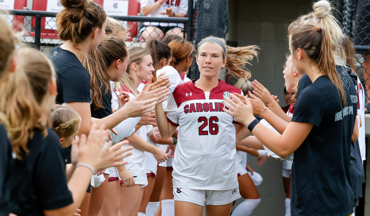 Claire Griffiths enters the field to play Florida State University at Eugene Stone Stadium on Aug. 18, 2022