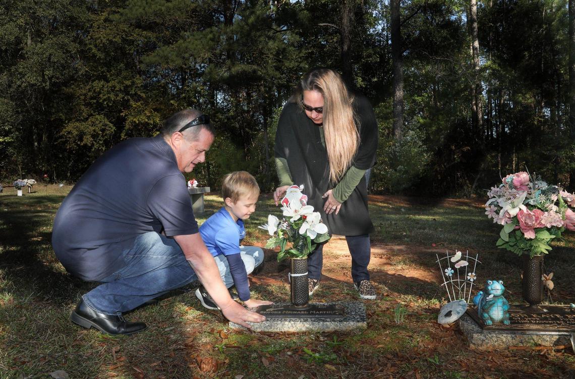 Tim and Amy Martin and their son Brady Martin visit Brooks Martin’s grave regularly.