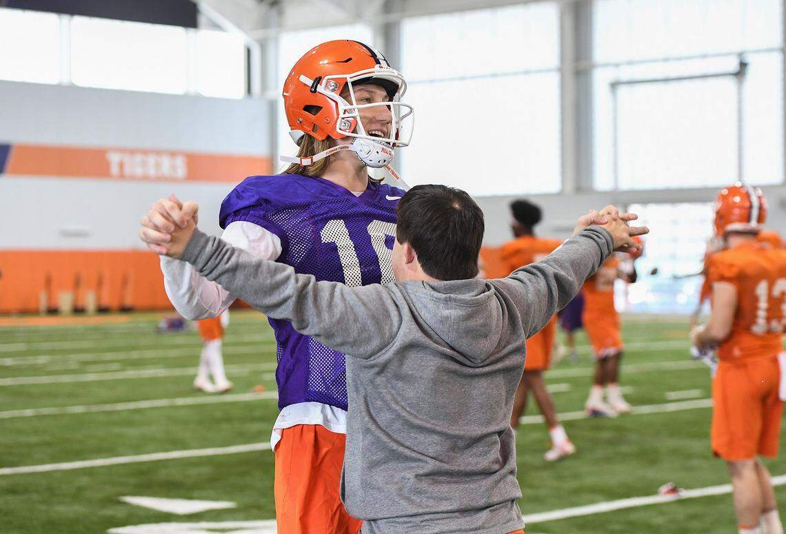 Clemson quarterback Trevor Lawrence (16) with team manager David Saville during the Tigers Cotton Bowl practice on Wednesday, December 12, 2018.