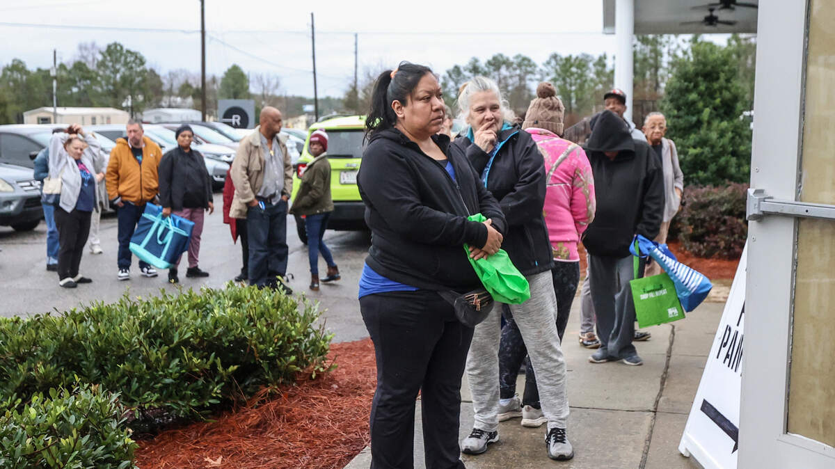 People line up outside the White Knoll campus of Radius Church on Thursday, Feb. 13 2025, for free eggs. There is a nationwide shortage of eggs due to the spread of the avian bird flu.