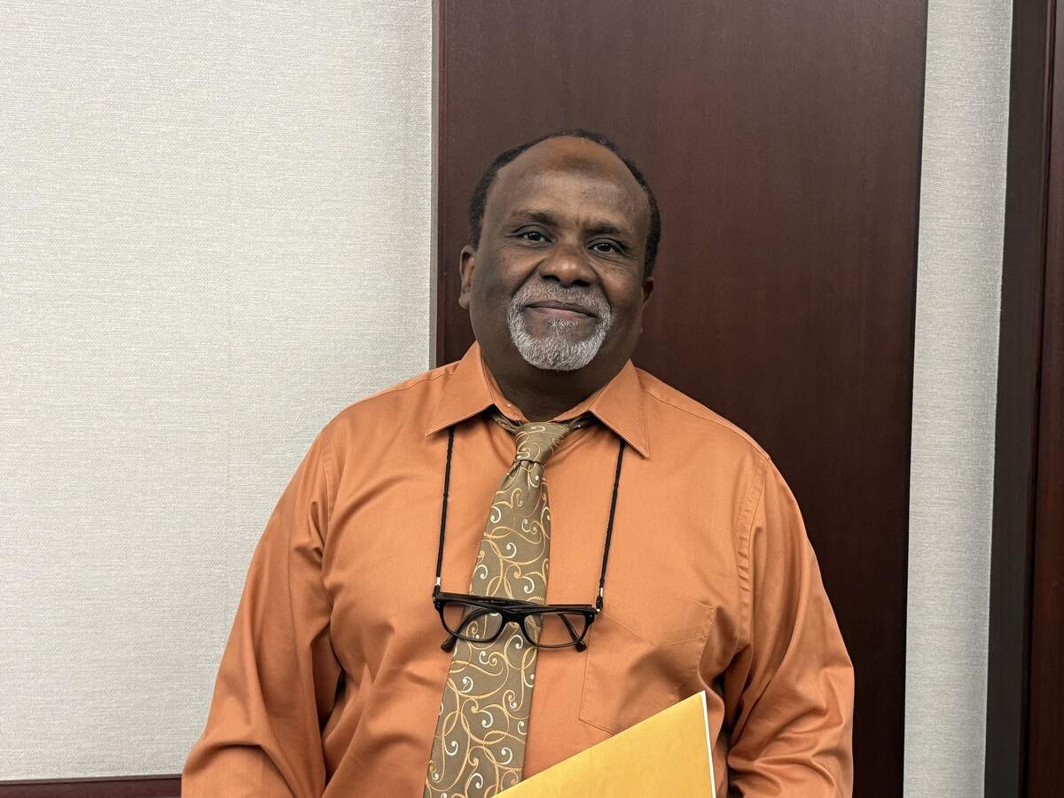 Ahmed Ali Mohammed, who came to the United States amid the Second Sudanese Civil War in 1995 attends a reception that followed his United States citizenship ceremony.