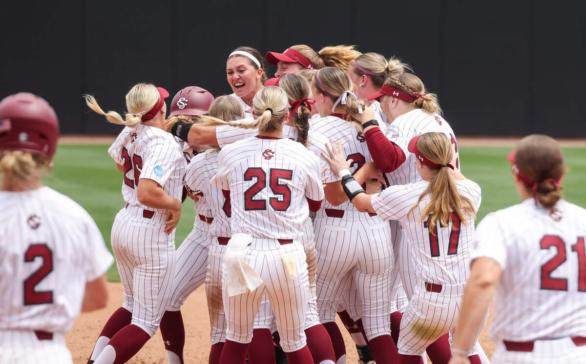 South Carolina players celebrate following the Gamecocks’ win over North Florida at Beckham Field in Columbia on Sunday, May 18, 2025.