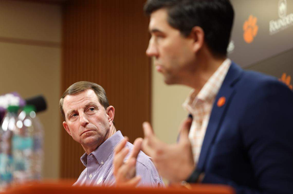 Clemson head coach Dabo Swinney (left) and athletic director Graham Neff speak during a press conference in Clemson on Friday, January 23, 2026.