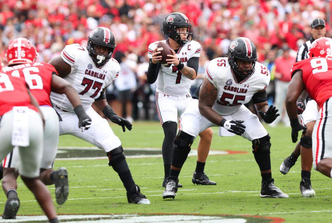 South Carolina quarterback Spencer Rattler (7) drops back for a pass during the first half of the Gamecocks’ game at Sanford Stadium in Athens on Saturday, September 15, 2023.