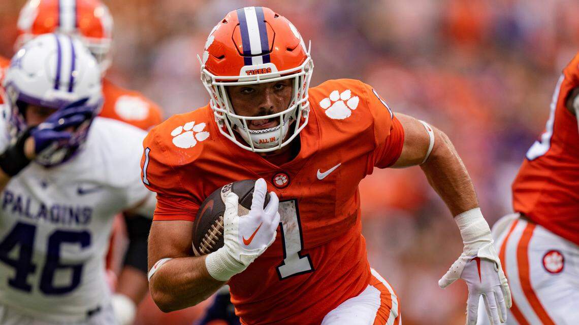 Clemson Tigers running back Will Shipley (1) runs with the ball against the Furman Paladins during an NCAA college football game in Clemson, S.C., Saturday, Sept. 10, 2022. (AP Photo/Jacob Kupferman)