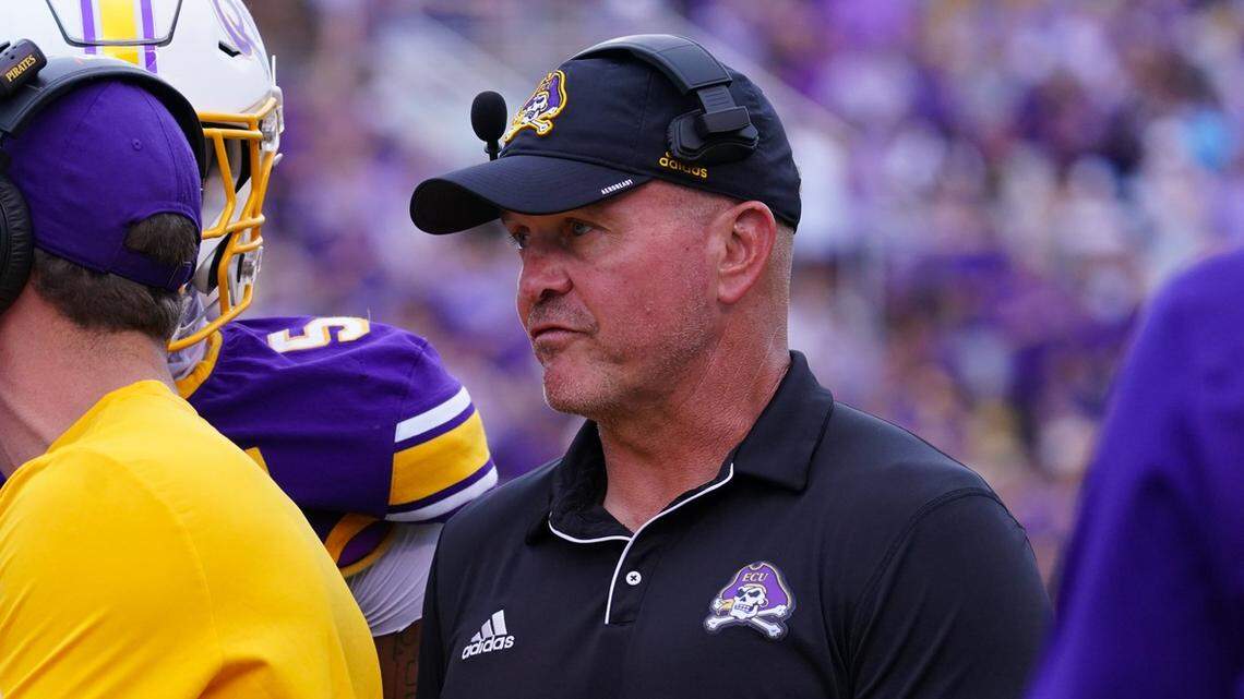 East Carolina Pirates head coach Mike Houston looks on against the Appalachian State Mountaineers during the first half at Dowdy-Ficklen Stadium.