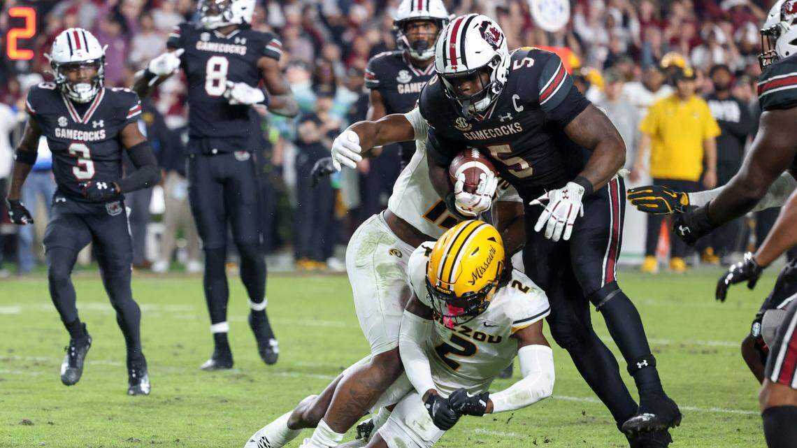South Carolina running back Raheim Sanders (5) runs the ball in for a touchdown as Missouri cornerback Toriano Pride Jr. (2) tries to make the stop during the Gamecocks’ game against Missouri at Williams-Brice Stadium in Columbia on Saturday, November 16, 2024.