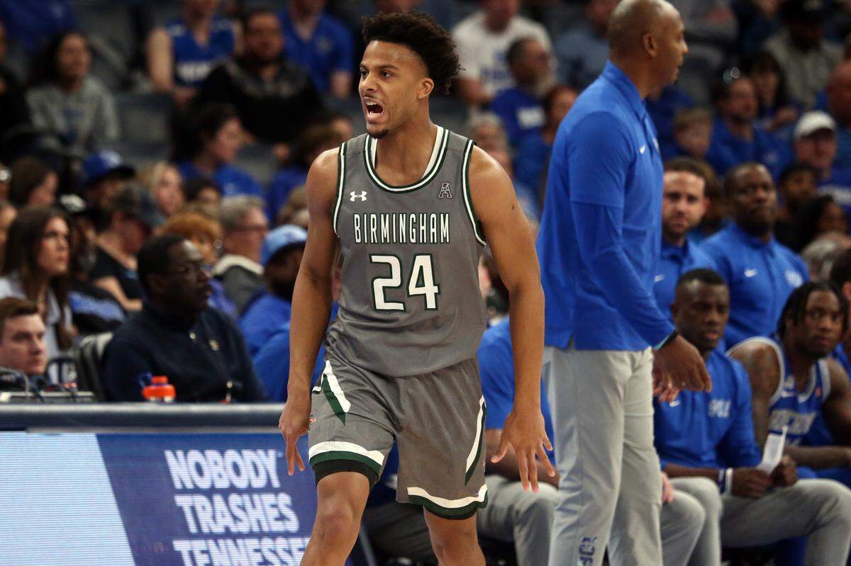 Mar 3, 2024; Memphis, Tennessee, USA; UAB Blazers guard Efrem Johnson (24) reacts during the first half against the Memphis Tigers at FedExForum.