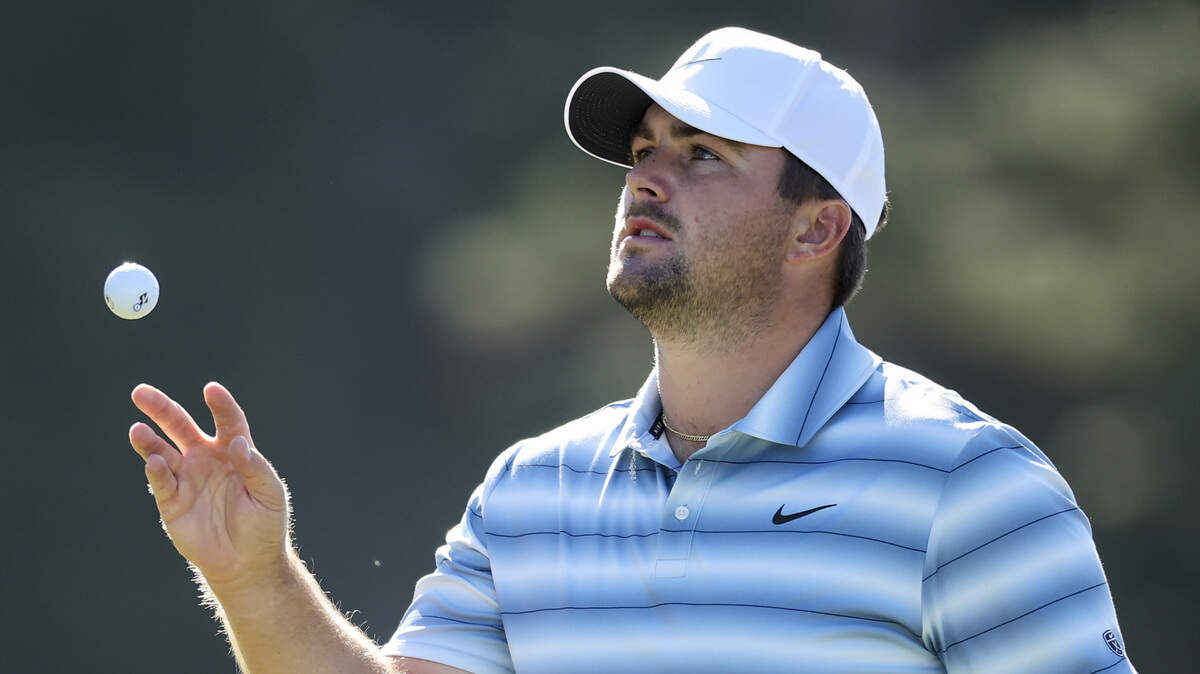 Chris Gotterup of the United States catches a golf ball on the first green Friday during the second round of the 2026 Masters Tournament at Augusta National Golf Club on April 10, 2026 in Augusta, Georgia.