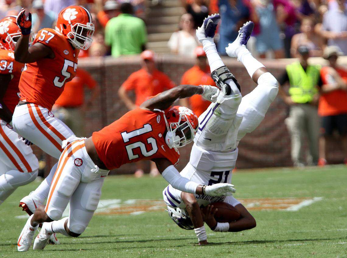 K’Von Wallace (12) defensive back Clemson University Tigers up ends quarterback JeMar Lincoln (12) of Furman during action between Furman and Clemson at Clemson Memorial Stadium September 1, 2018 in Clemson, S.C. (John Byrum photo/Sideline Carolina)