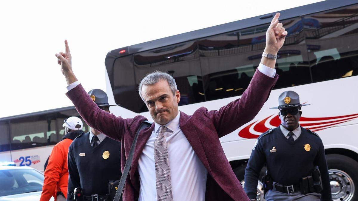 South Carolina head coach Shane Beamer waves to supporters after arriving for the Palmetto Bowl between South Carolina and Clemson at Memorial Stadium in Clemson on Saturday, November 30, 2024.