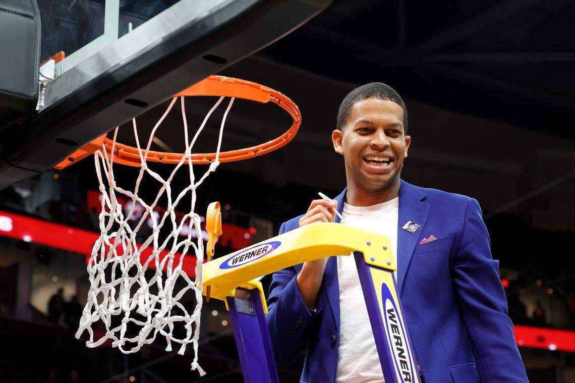 University of South Carolina Assistant Coach Winston Gandy cuts the net after winning the the National Championship game at the Rocket Mortgage FieldHouse in Cleveland, Ohio on Sunday April 7, 2024.