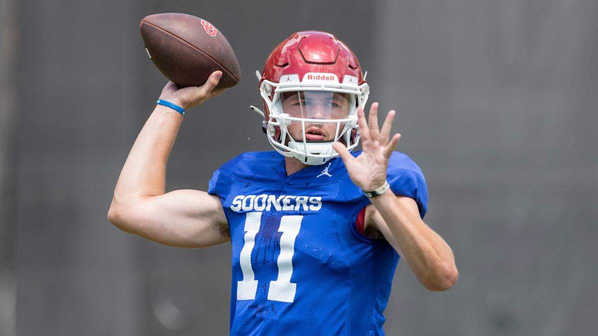 Oklahoma Quarterback Davis Beville (11) goes through drills as the University of Oklahoma Sooners (OU ) hold fall football camp outside The Gaylord Family Oklahoma Memorial Stadium on Wednesday, Aug. 10, 2022 in Norman, Okla. oufoot -- print jump