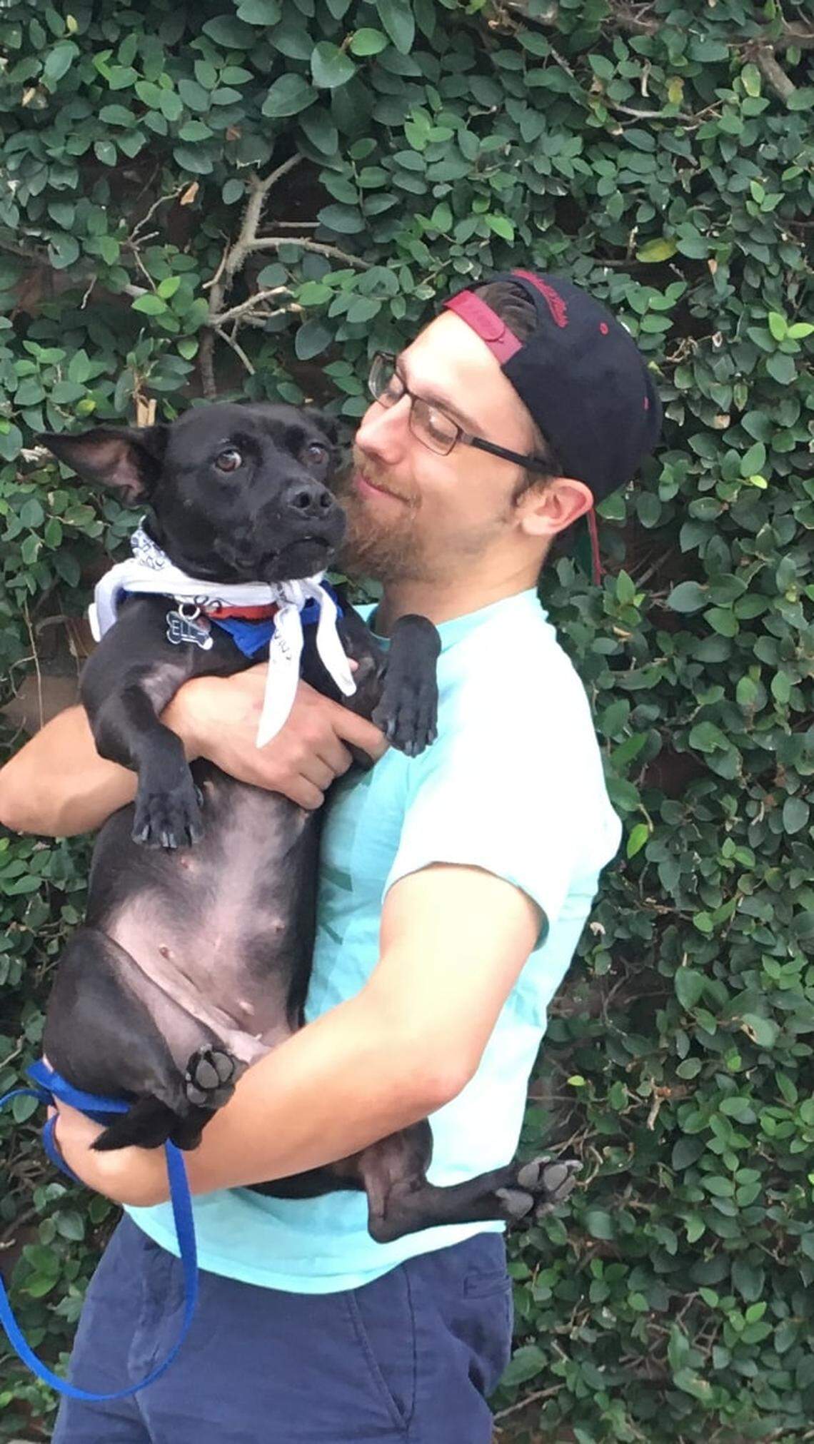 Pictured here is Ella and her human Lucas. Ella’s face describes exactly how your loved one can feel getting an unexpected dog for Christmas.