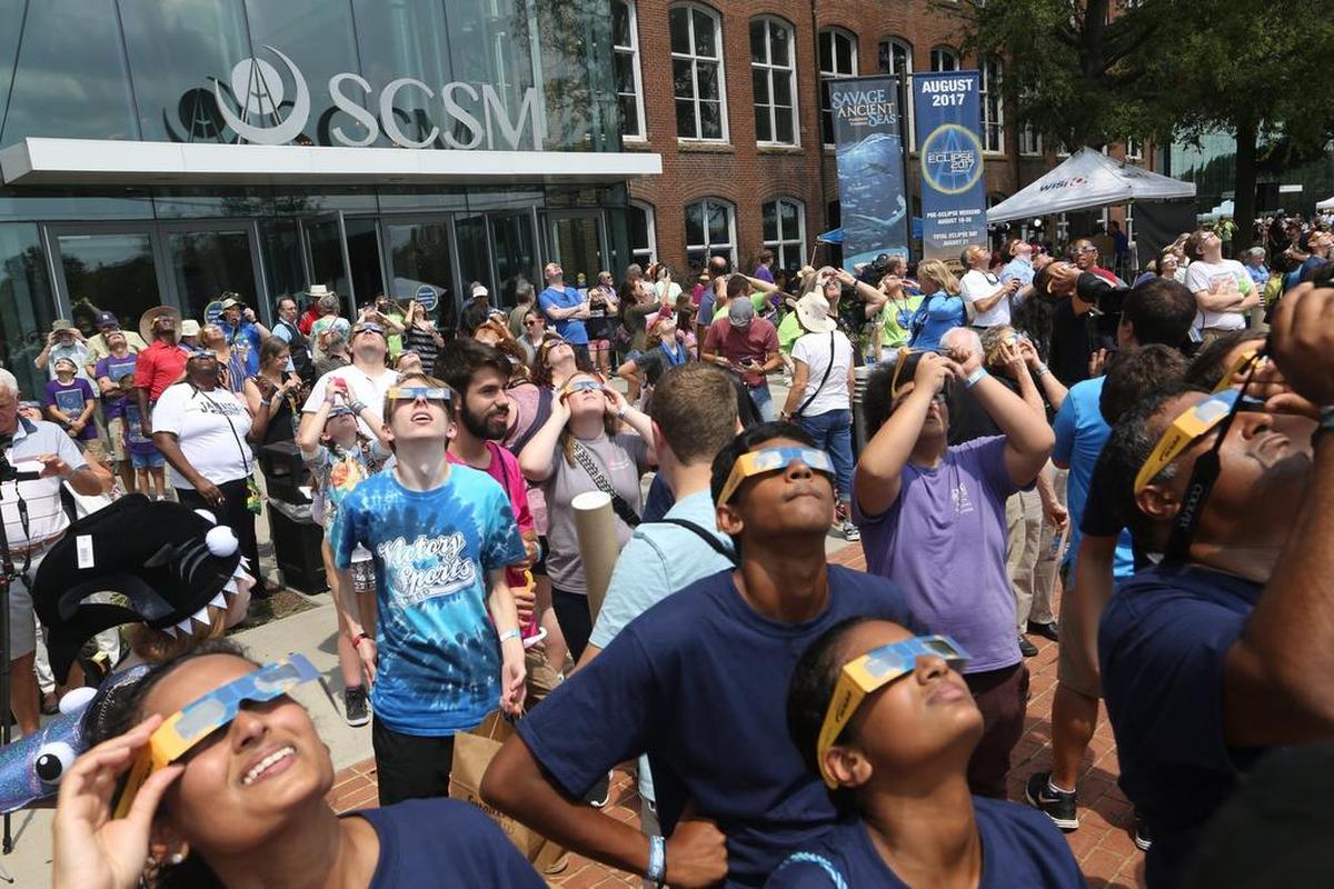 People view the eclipse at the South Carolina State Museum where 4000 people are gathered to view the Total Solar Eclipse.
