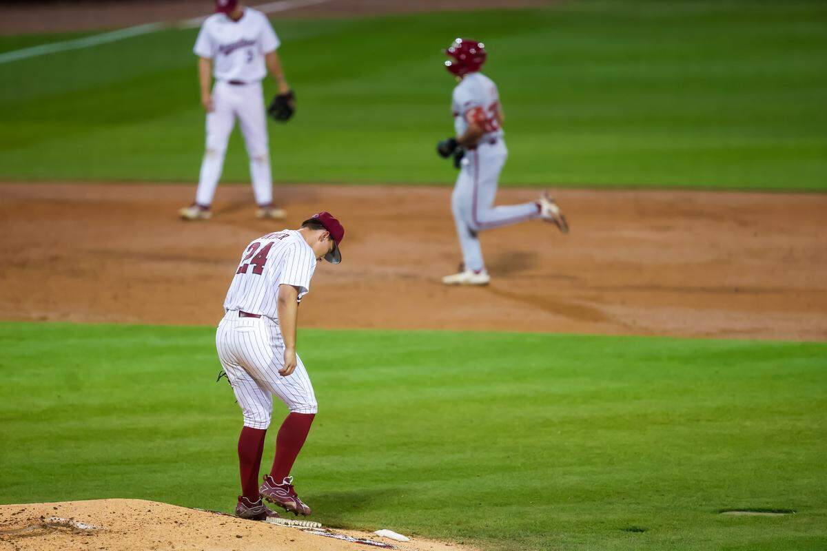South Carolina Gamecocks pitcher Josh Gunther (24) reacts as an Arkansas batter rounds the bases on a home run during the game between Arkansas and South Carolina at Founders Park, 3/20/26.