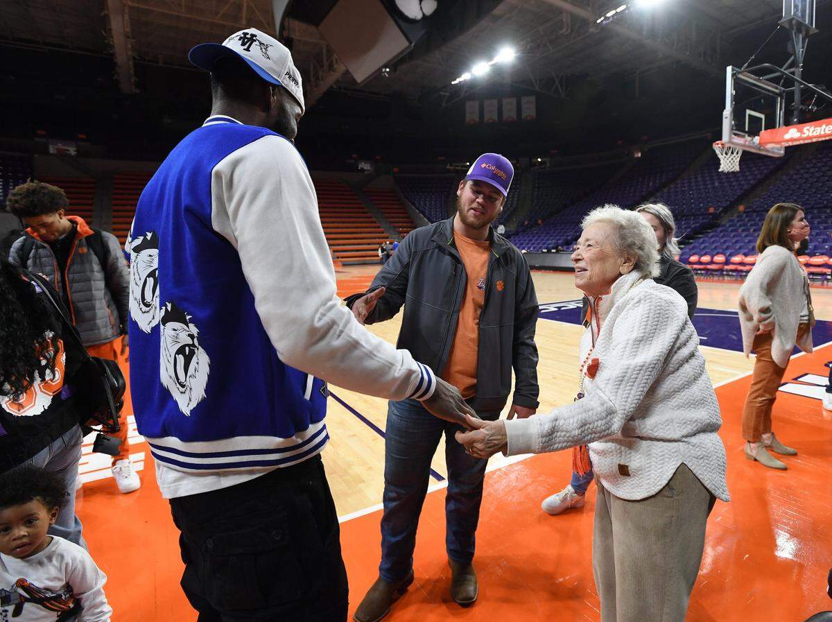 Clemson basketball fan Paula Grooms and her grandson Jag talk with Clemson forward Naz Bohannon after the Tigers game against Pitt Saturday, January 22, 2022. Bart Boatwright/Special to The State