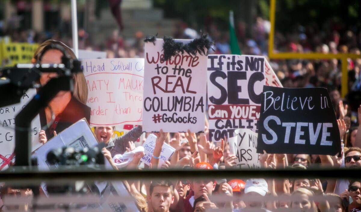 Fans’ signs during ESPN’s College GameDay broadcast in 2014 from the University of South Carolina’s Horseshoe.