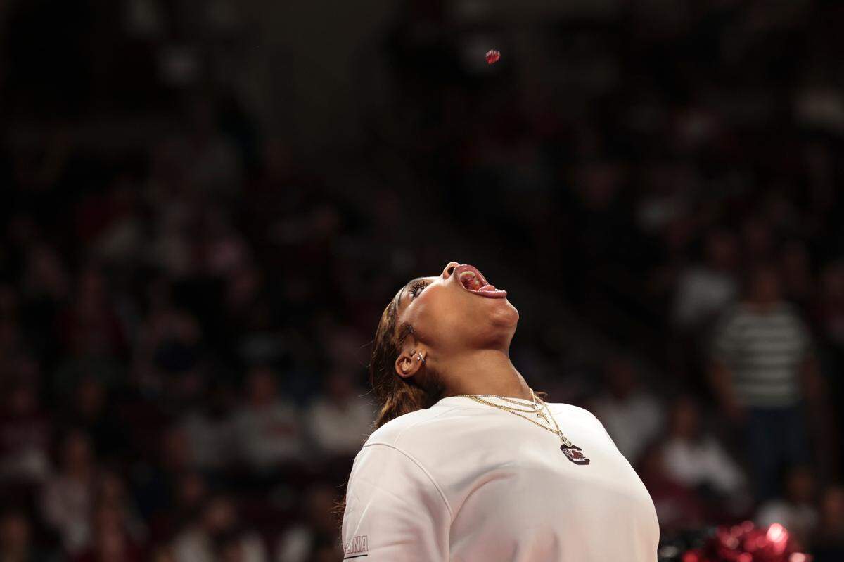 University of South Carolina center Sakima Walker (35) catches candy before an exhibition game in the Colonial Life Arena on Monday, Oct. 28, 2024.