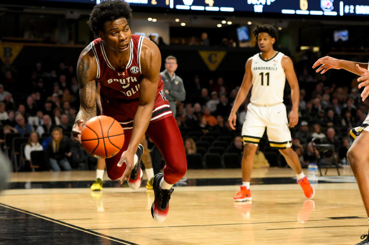 South Carolina Gamecocks forward Nick Pringle (5) saves the ball against the Vanderbilt Commodores during the first half at Memorial Gymnasium.