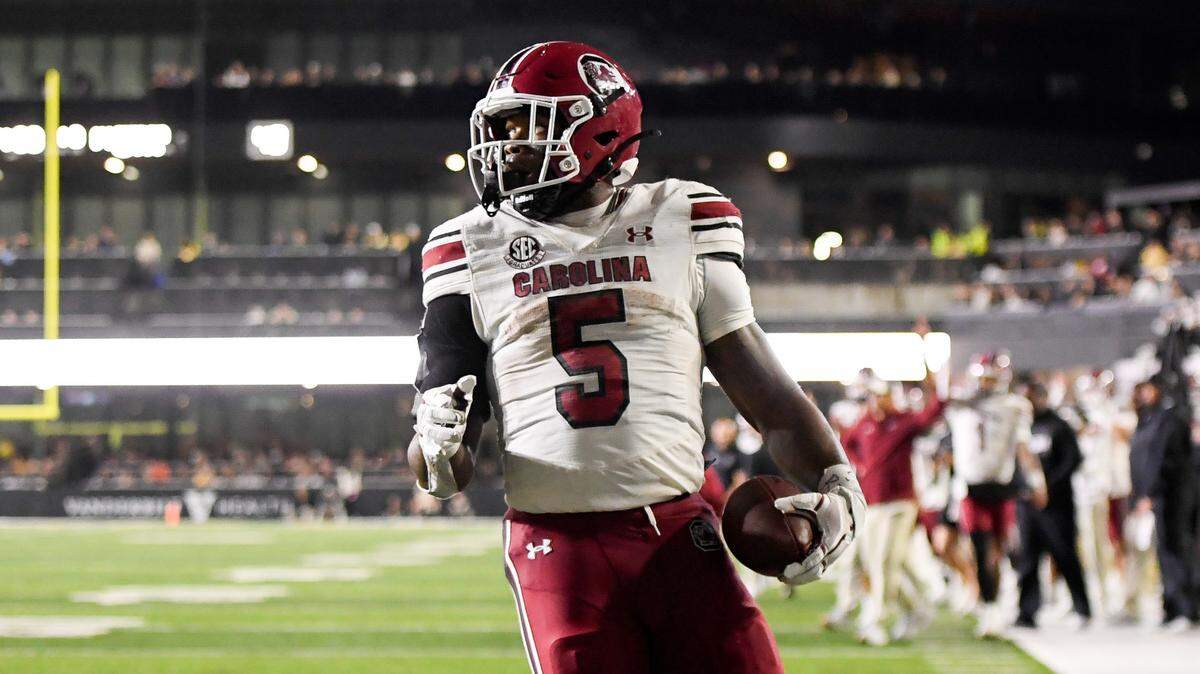 Nov 9, 2024; Nashville, Tennessee, USA; South Carolina Gamecocks running back Raheim Sanders (5) scores a touchdown against the Vanderbilt Commodores during the second half at FirstBank Stadium. Mandatory Credit: Steve Roberts-Imagn Images