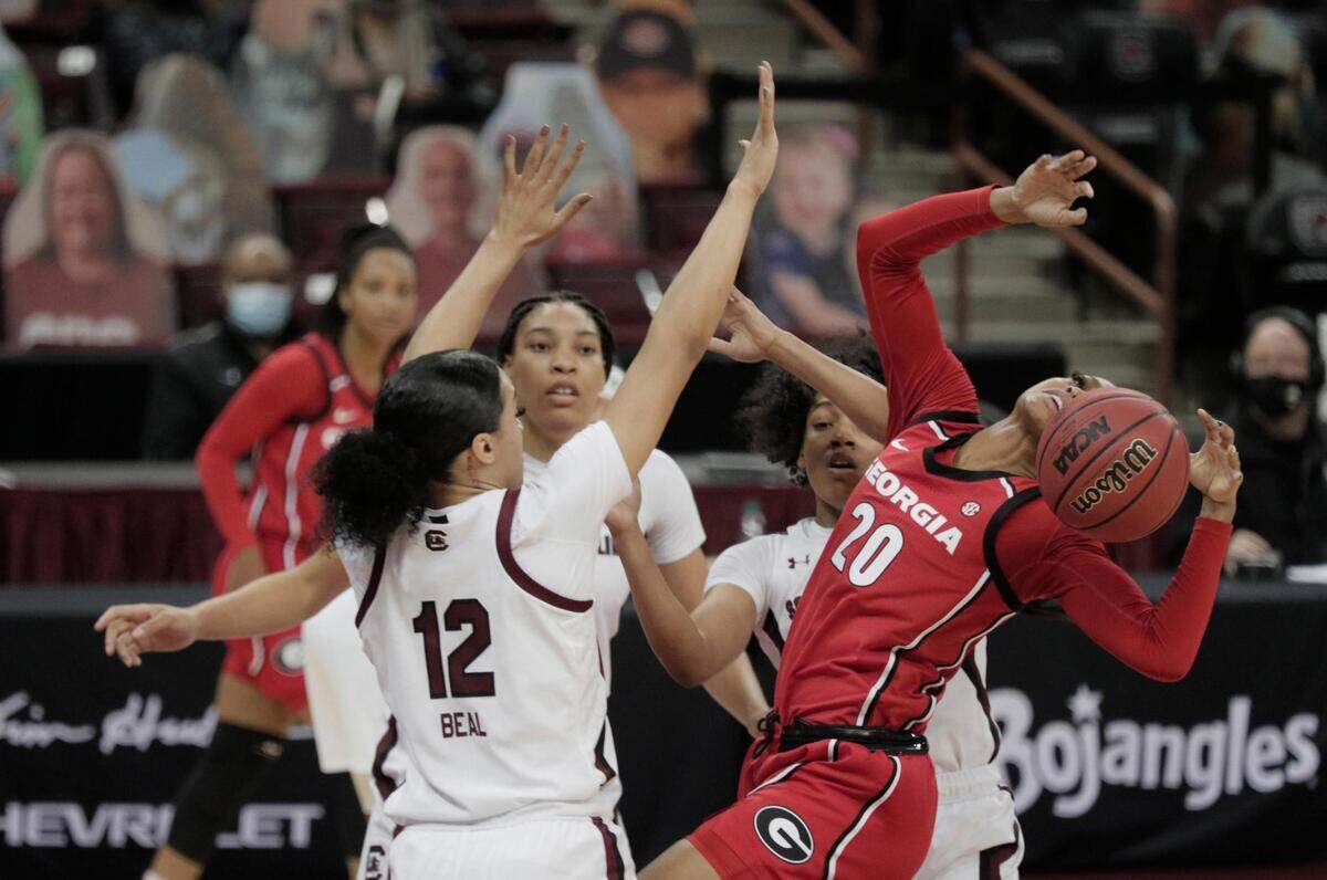 Georgia Lady Bulldogs forward Jordan Isaacs (20) falls at Colonial Life Arena on Thursday, January 21, 2021.