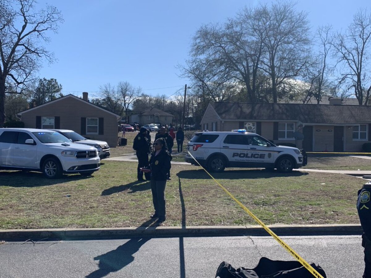 Officers with the Columbia Police Department investigate a fatal shooting.