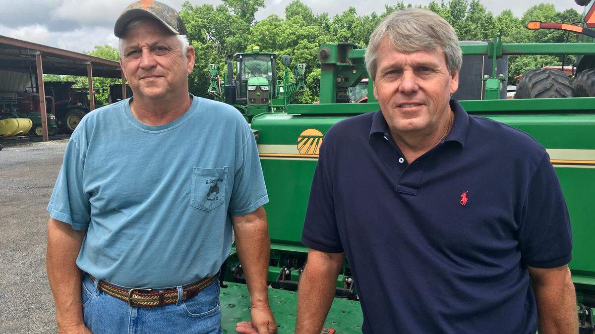 Barry Hutto, left, and Jeff Reeves, right, resigned from the Tri-County Electric Cooperative board last Thursday at the co-op's annual meeting. Hutto and Reeves said they were frustrated that some members of the board had fought a plan to rein in board pay.