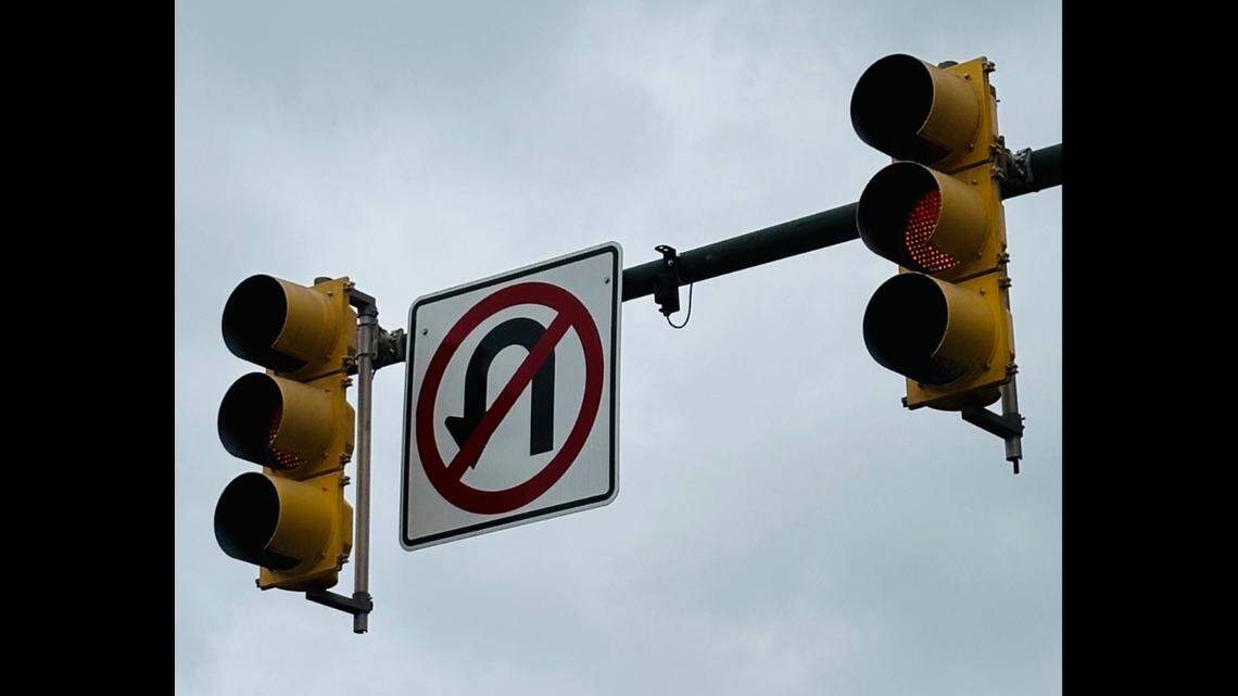 An image of a traffic light flashing a yellow signal.