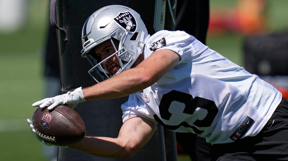 Las Vegas Raiders wide receiver Hunter Renfrow catches a pass during practice at the NFL football team’s practice facility Thursday, June 2, 2022, in Henderson, Nev. (AP Photo/John Locher)